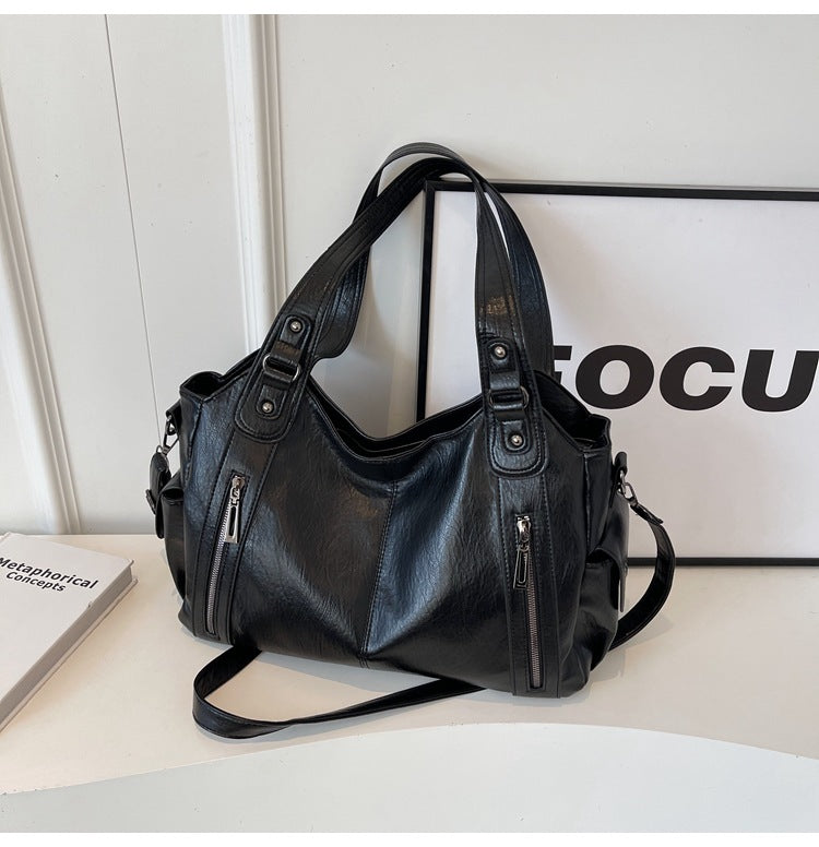 Classic structured tote bag in dark brown with comfortable shoulder straps