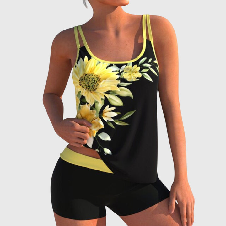 Floral print tankini with a dark base in blue, yellow and turquoise colourways