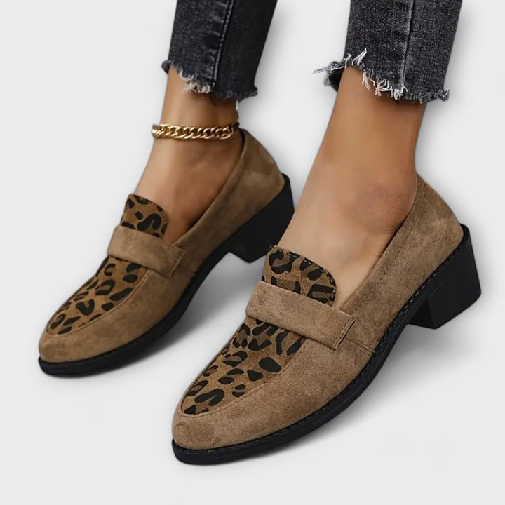 Leopard print loafers in brown tones with a classic, elegant silhouette