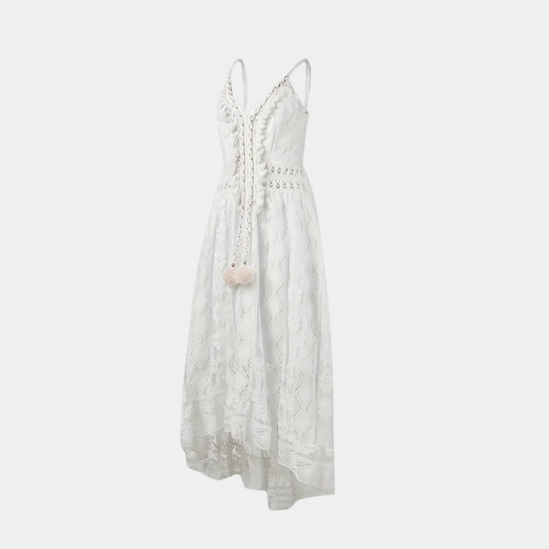 Woman wearing the Alice™ elegant boho midi dress with intricate detailing and a V-neckline at a summer garden party.