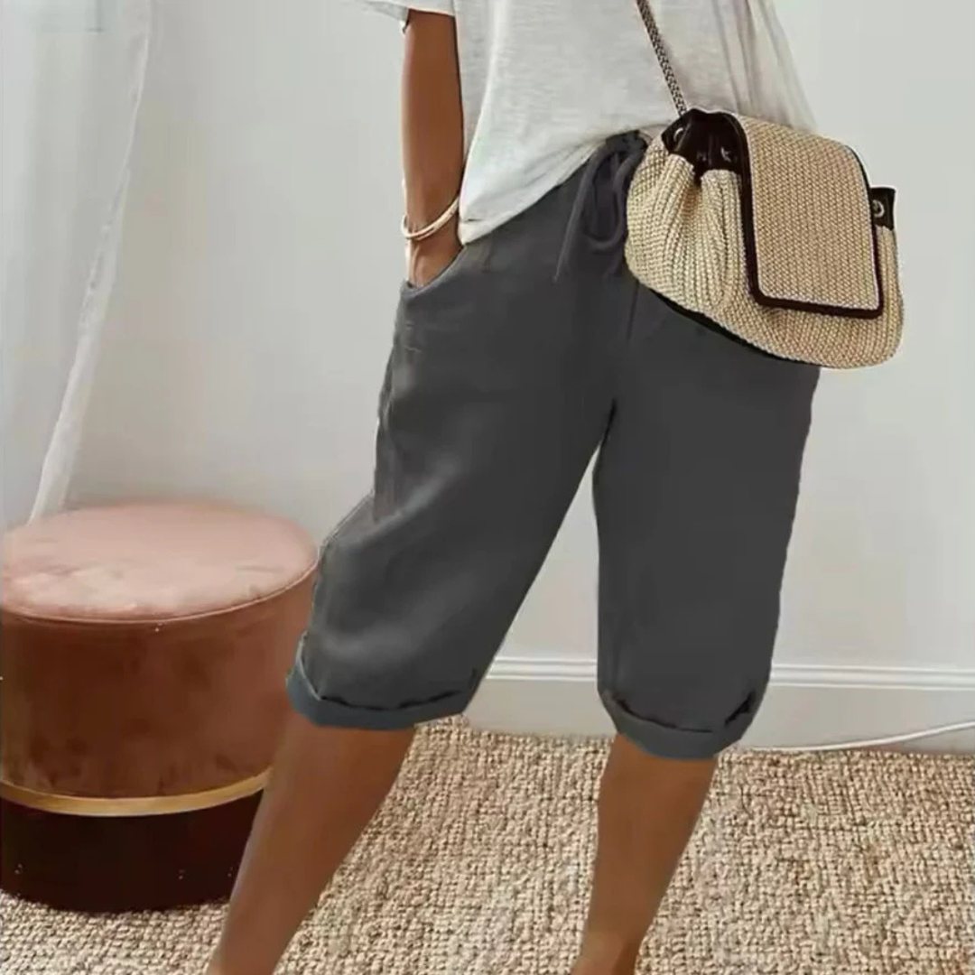 A pair of relaxed-fit summer shorts in beige with an elasticated drawstring waist
