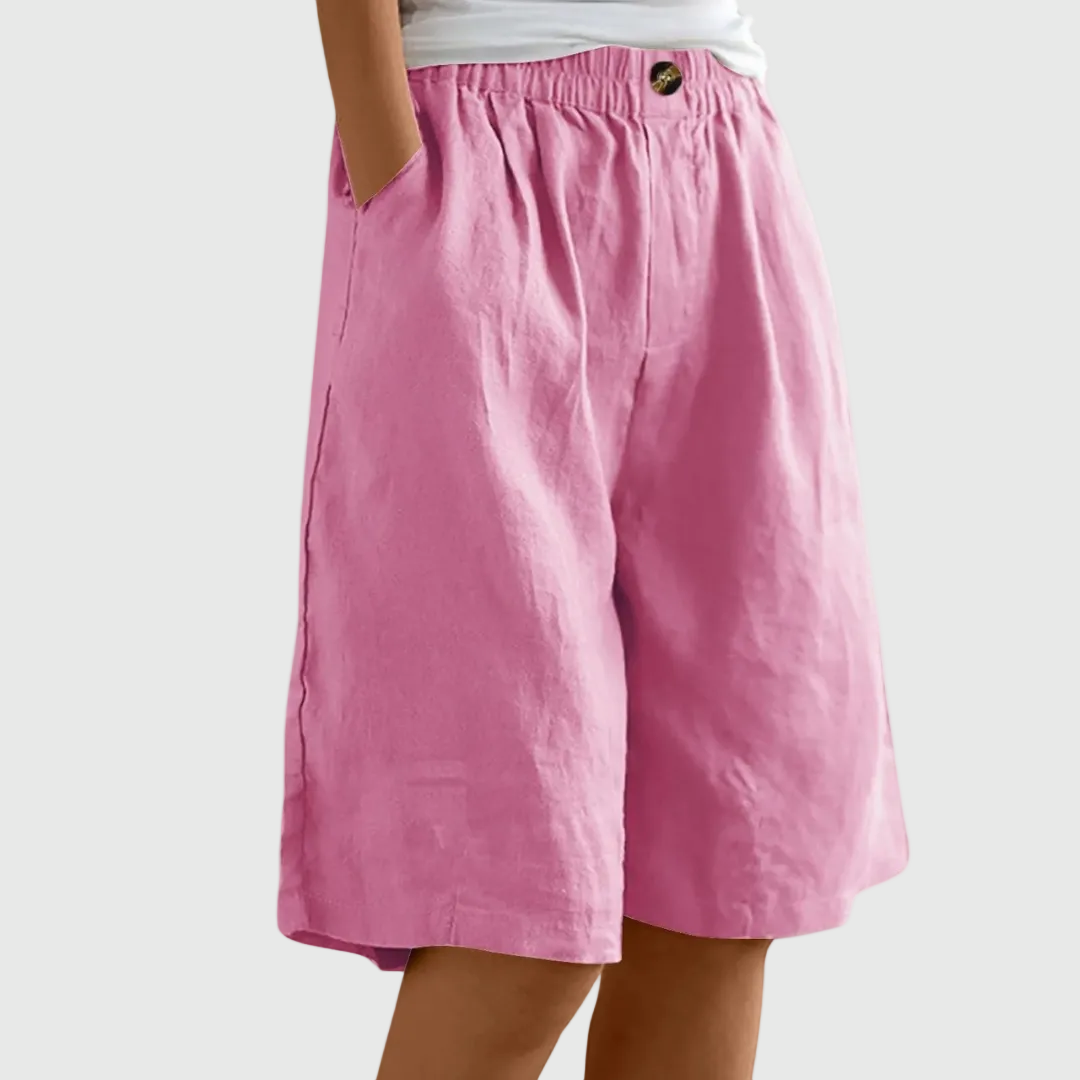 Women's casual leisure shorts in soft pink with an elasticated waist and relaxed fit