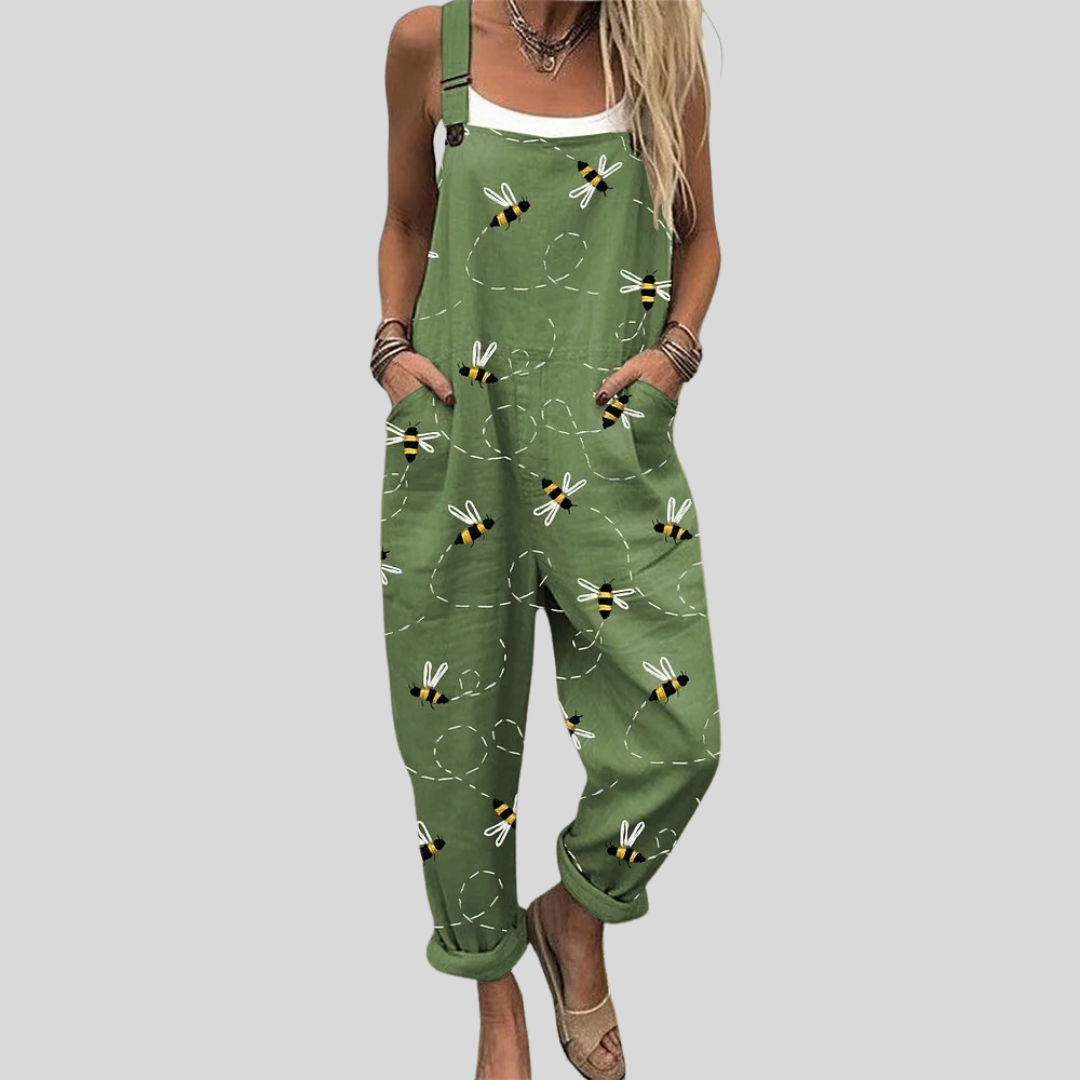 Relaxed wide-leg green dungarees with cheerful bee-and-dot print, adjustable straps, from Mary Cork Ireland.