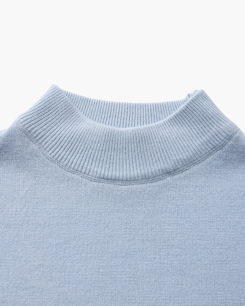 Men's black ribbed roll-neck jumper with a clean structured silhouette