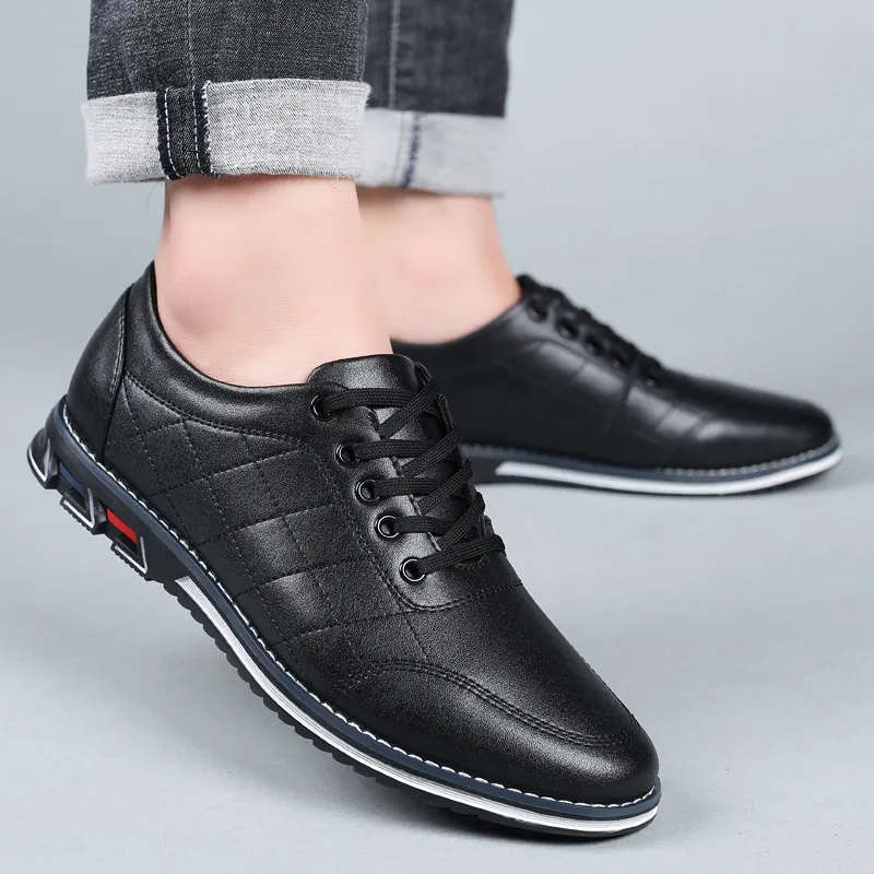 Men's black comfort dress shoes with a clean profile and polished upper on a neutral background
