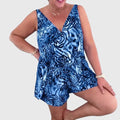 Women's swim dress in blue, purple and green with an elegant skirt silhouette