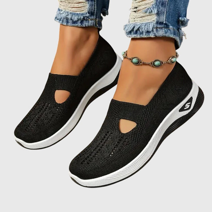 A woman out for a long walk in supportive orthopaedic walking shoes.