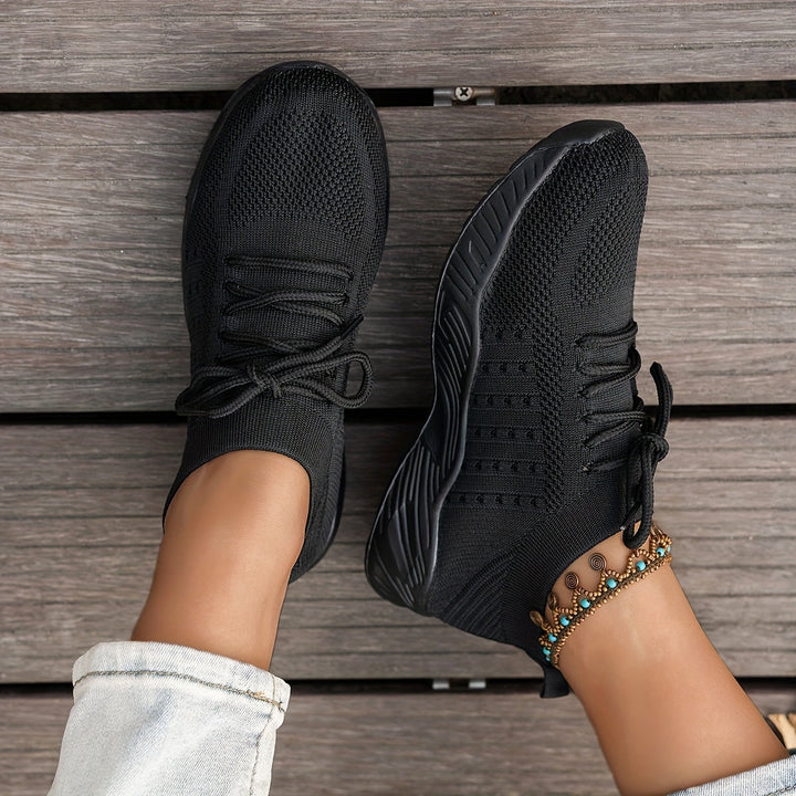 A woman wearing ultra-light comfort trainers on a long walk