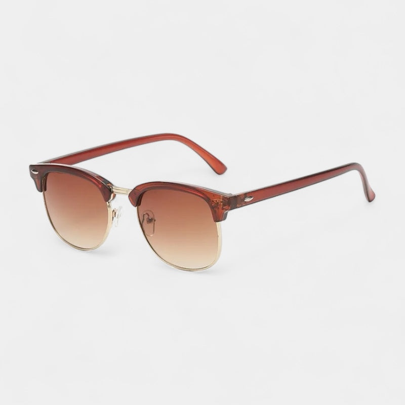 Men's vintage classic sunglasses in black and gold with a refined, understated frame