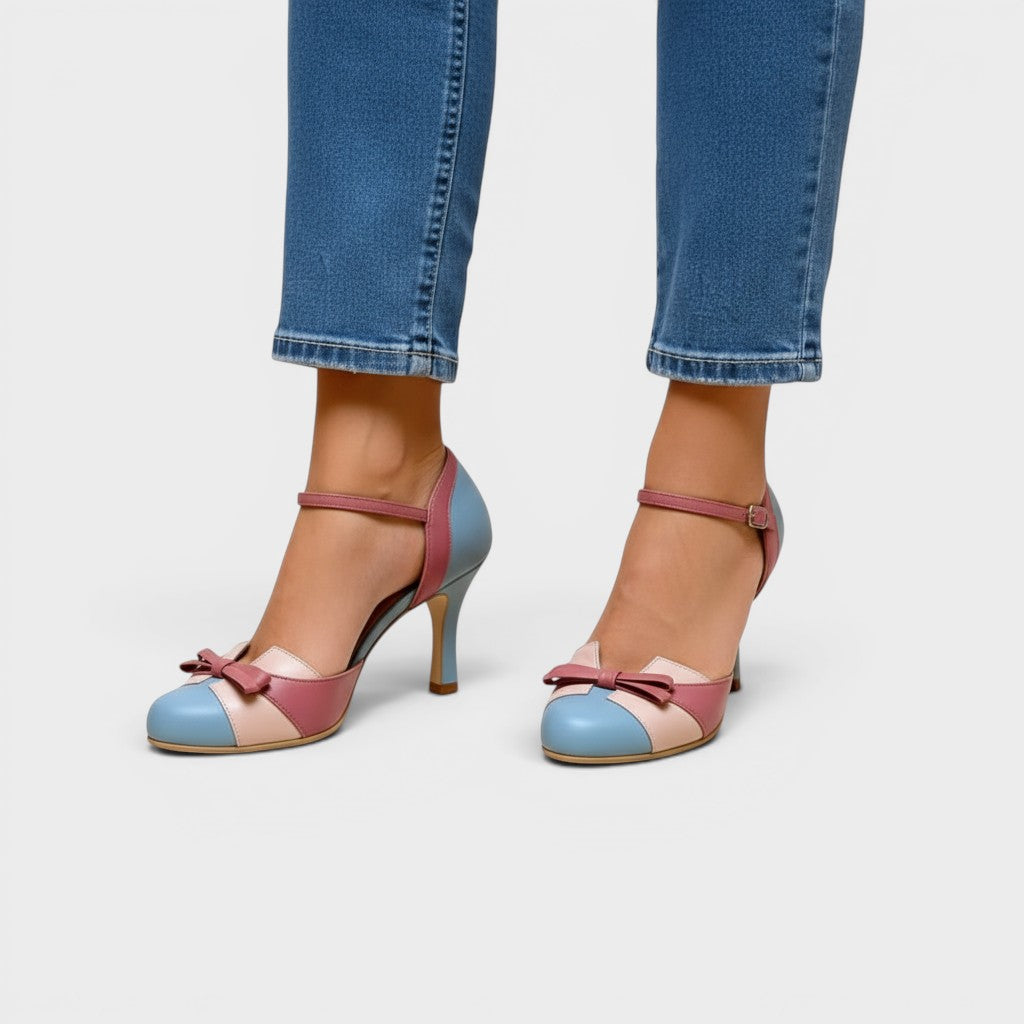 Women's elegant cushioned heels in blue with a stable mid-height heel and refined silhouette