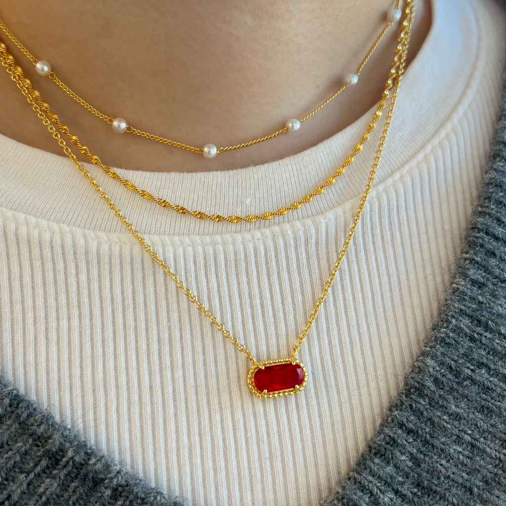Delicate pendant necklace with coloured gemstone in turquoise
