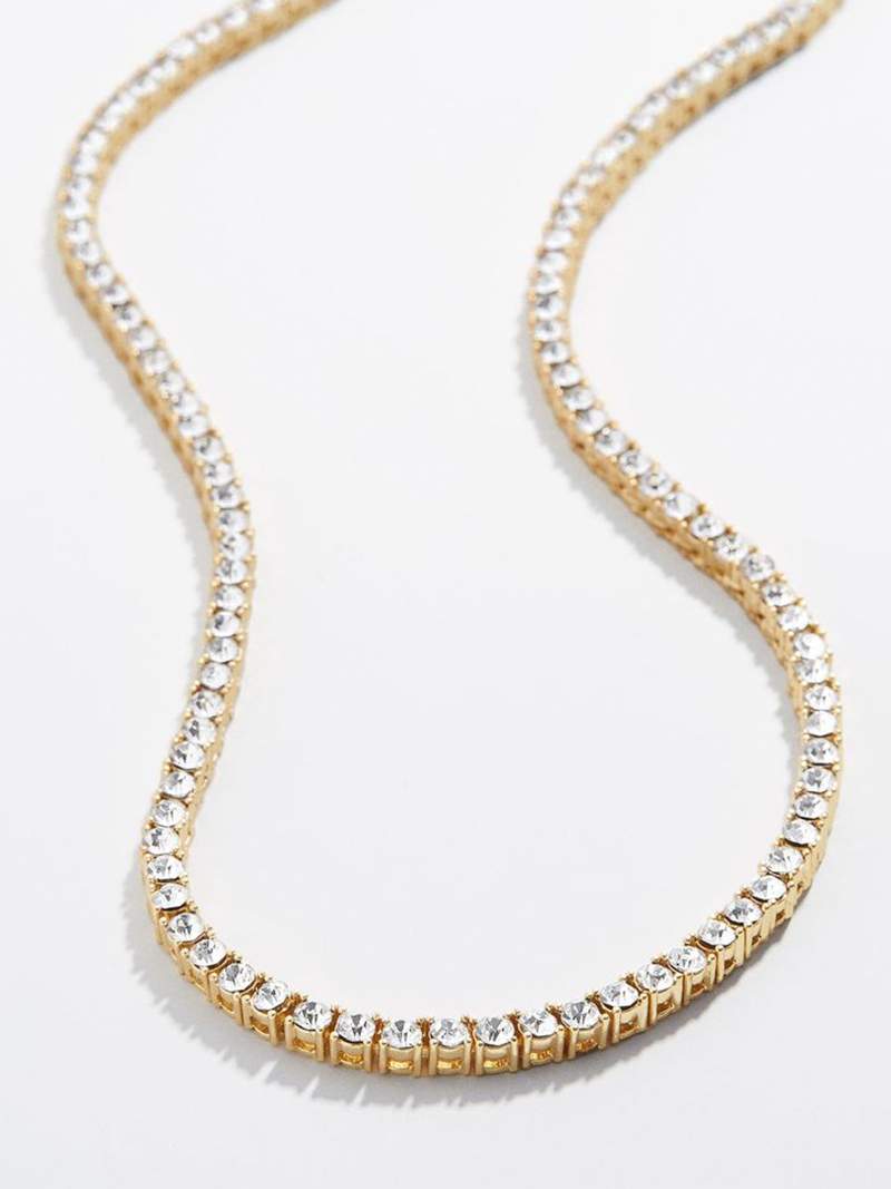 Rivière necklace with a continuous row of crystal stones in gold-plated finish