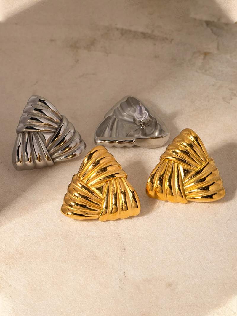 Gold triangular drop earrings with polished vintage-inspired finish