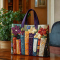 Quilted tote bag with a book lovers motif featuring stacked books and reading scenes on a structured padded body