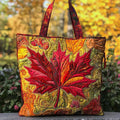 Quilted tote bag with a maple tree in amber and golden autumn sunset colours