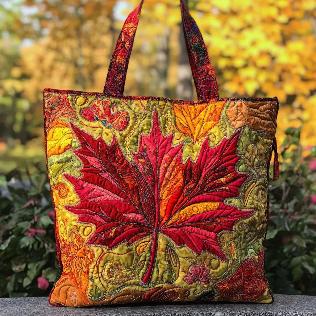 Quilted tote bag with a maple tree in amber and golden autumn sunset colours
