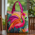 Quilted tote bag with a rainbow flamingo design and wave-stitch pattern in a padded, structured shape
