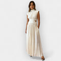 Sleek cut-out high-neck evening dress in crisp white with a close-fitted silhouette