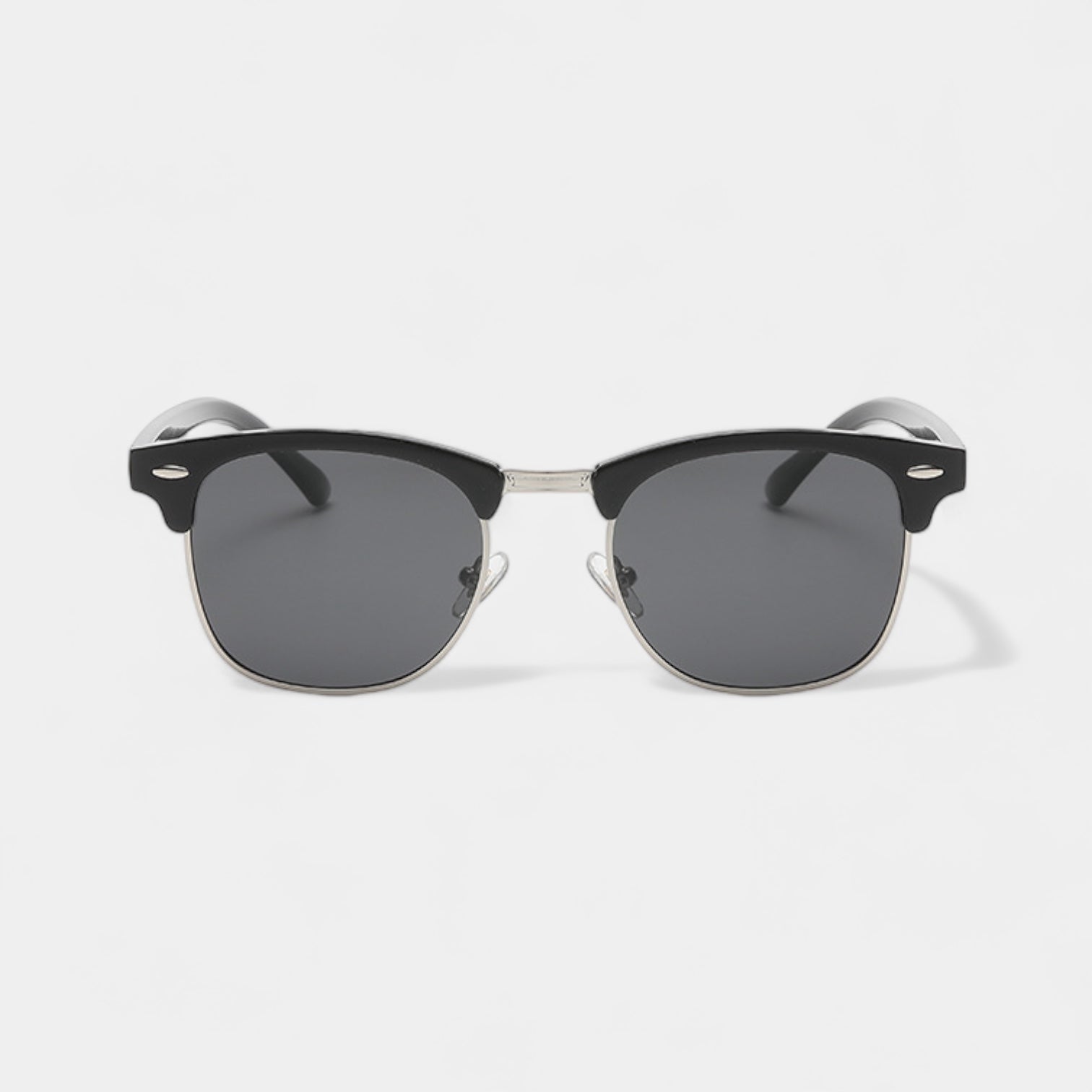 Men's vintage classic sunglasses in black and gold with a refined, understated frame