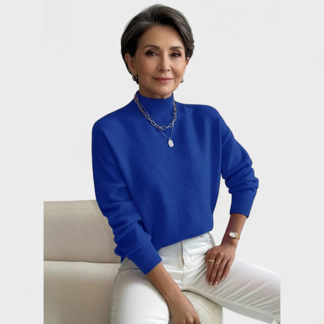 Soft roll-neck jumper in a close, elegant fit available in white, black and pastel shades
