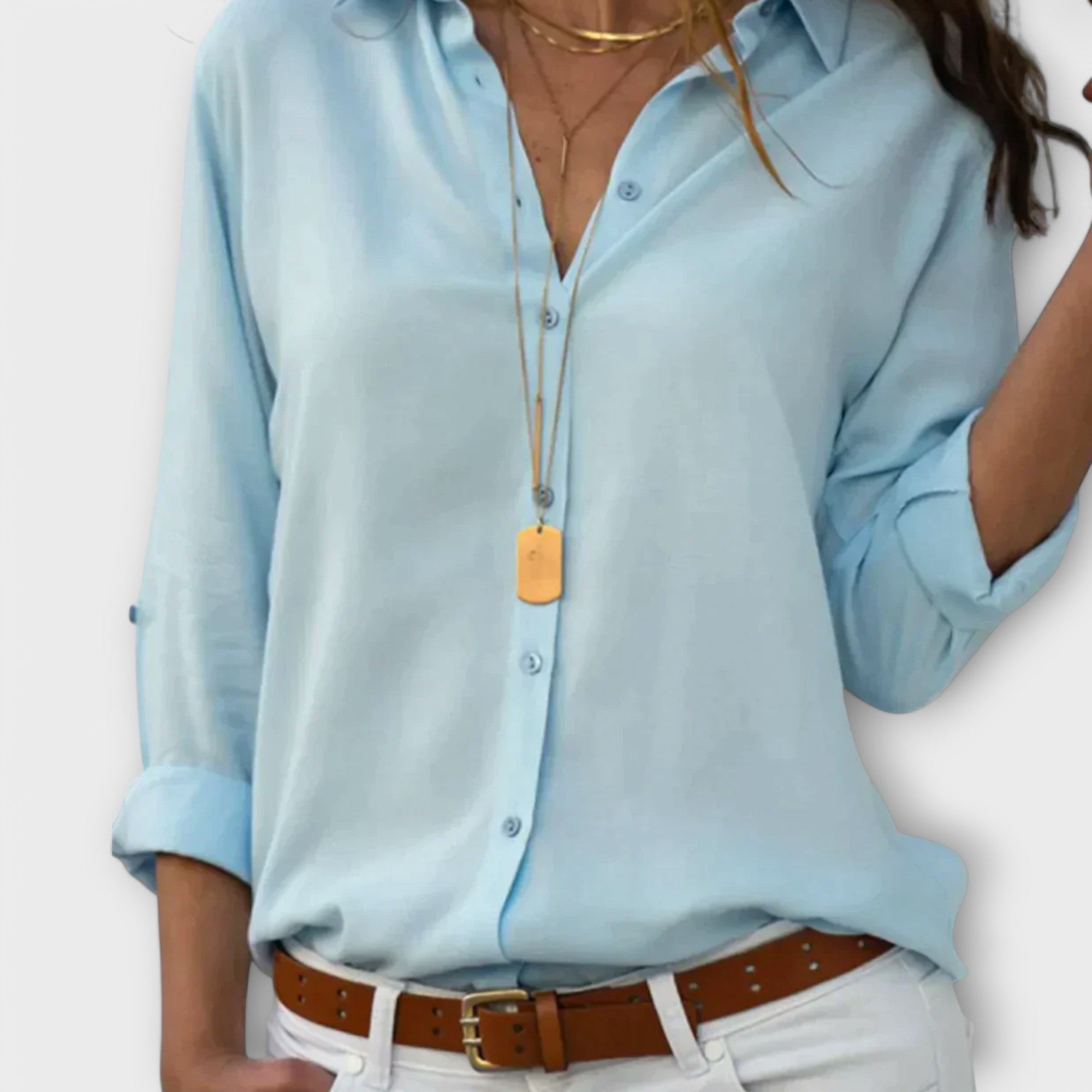 Classic collar pleated-front blouse with three-quarter sleeves in a refined, flowing shape