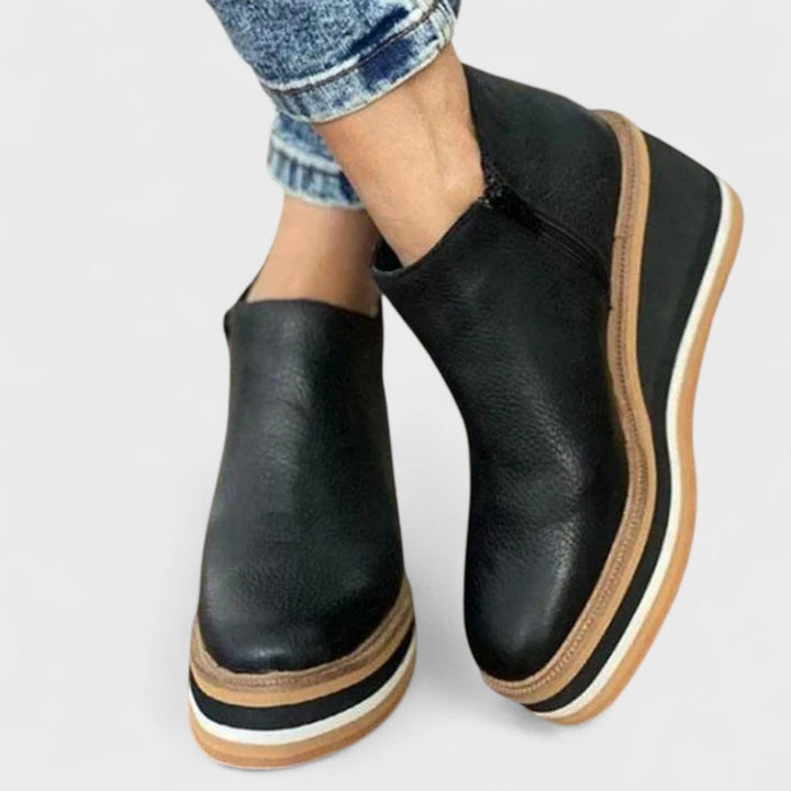 Waterproof side-zip boots in khaki, black, beige, brown and blue with a sleek, elegant silhouette