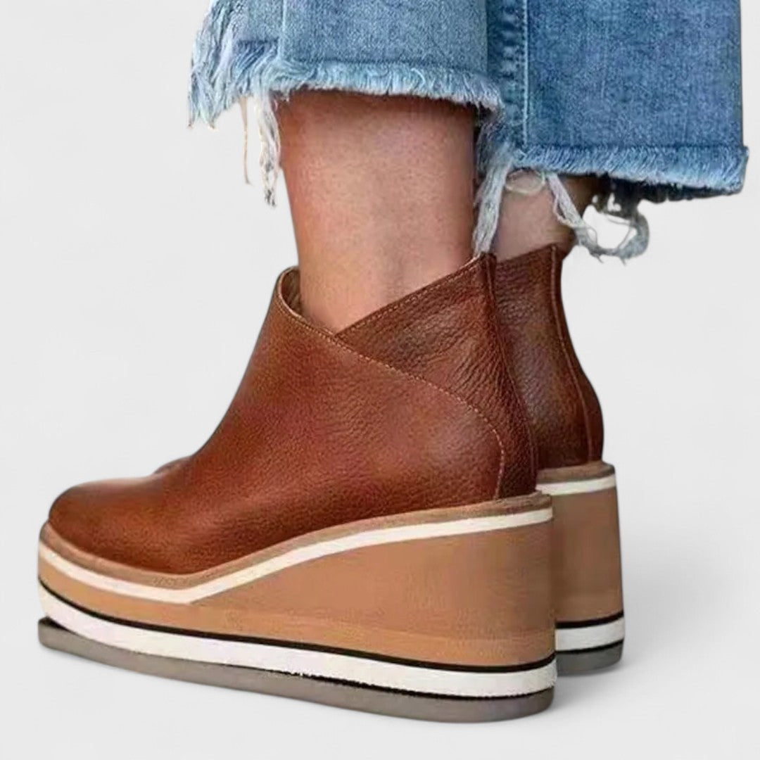 Waterproof side-zip boots in khaki, black, beige, brown and blue with a sleek, elegant silhouette