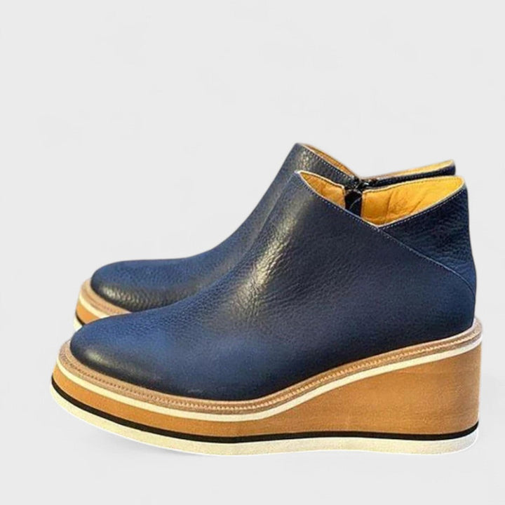 Waterproof side-zip boots in khaki, black, beige, brown and blue with a sleek, elegant silhouette