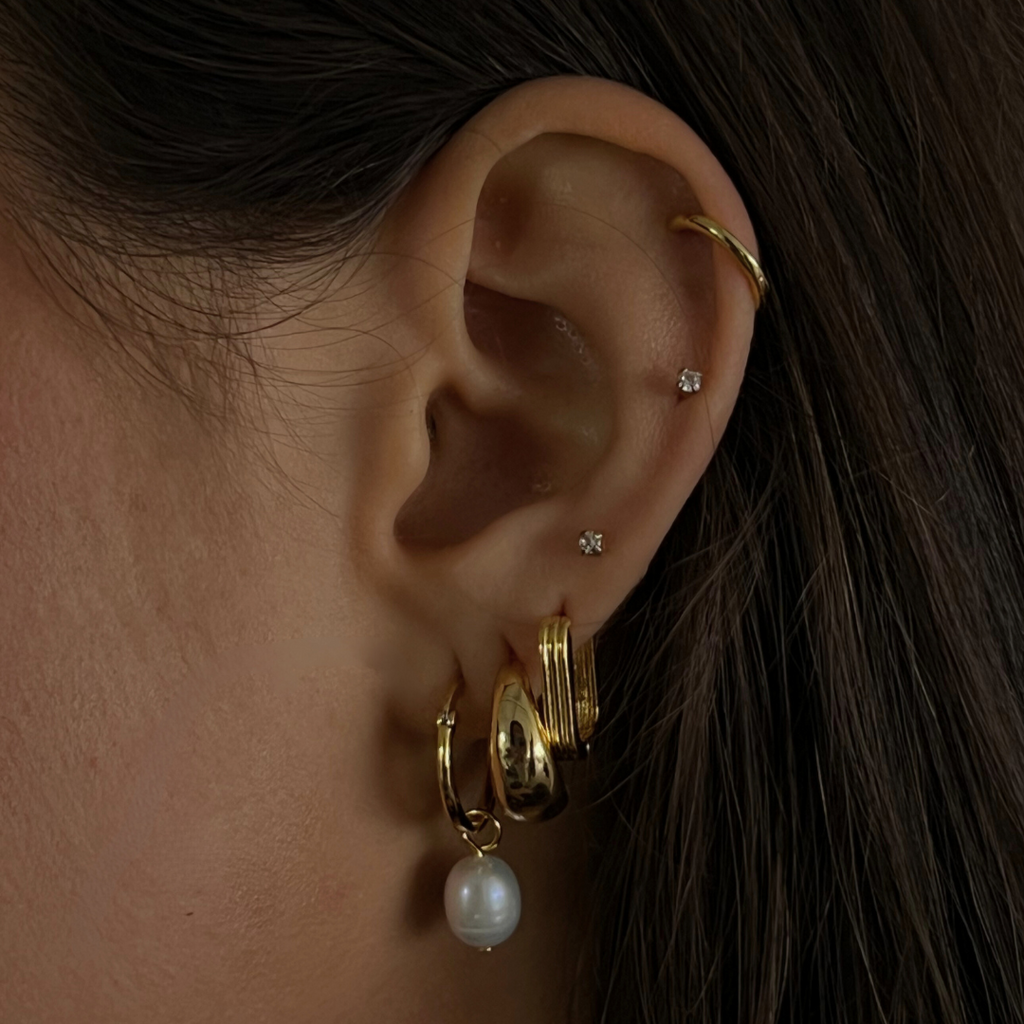 Gold hoop earrings available in small and large sizes