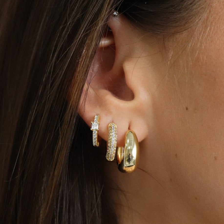 Gold hoop earrings available in small and large sizes