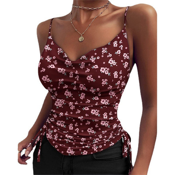 White sleeveless fitted top with adjustable side ties and a smooth, floaty drape