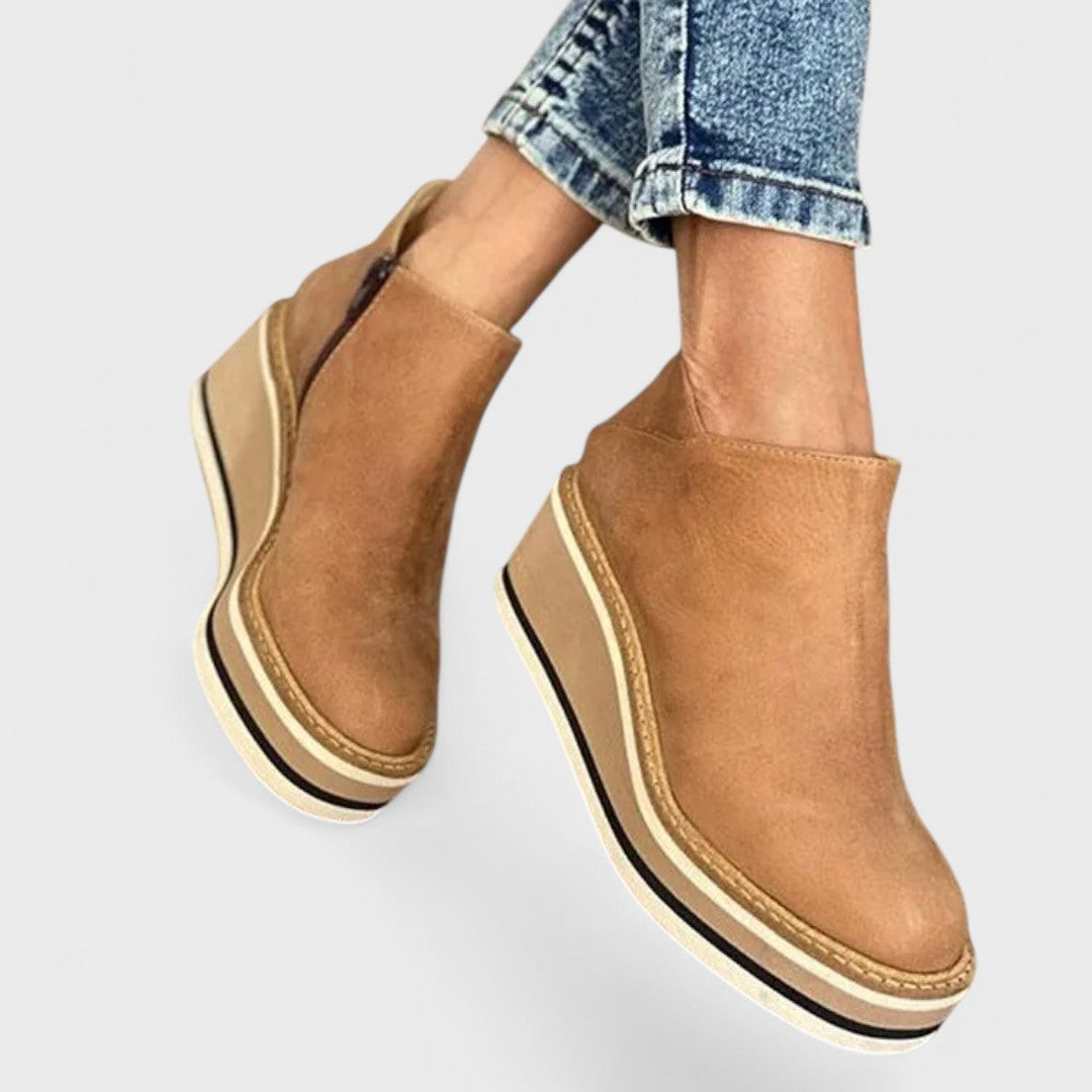 Waterproof side-zip boots in khaki, black, beige, brown and blue with a sleek, elegant silhouette