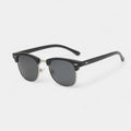 Men's vintage classic sunglasses in black and gold with a refined, understated frame