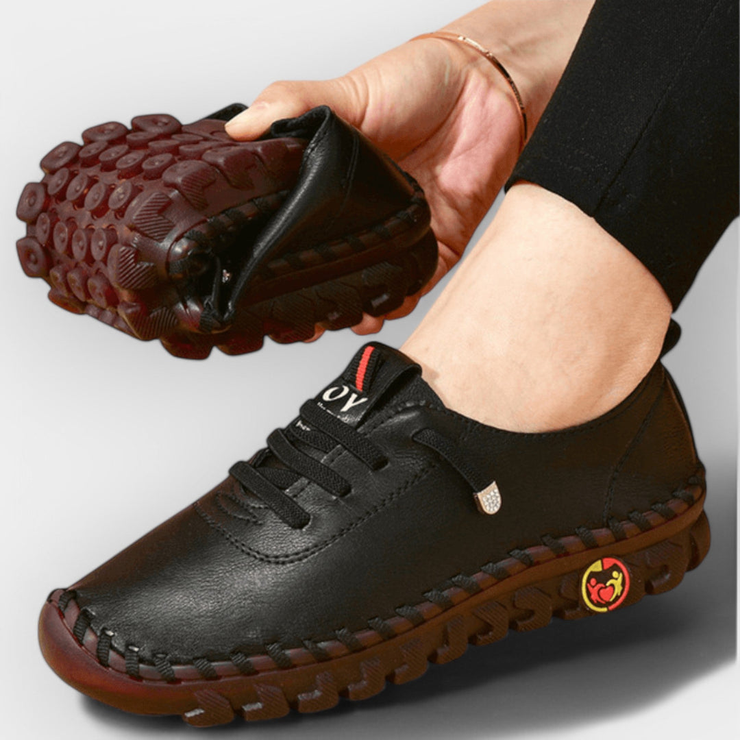 Women's slip-on comfort loafers with a cushioned ergonomic sole in black