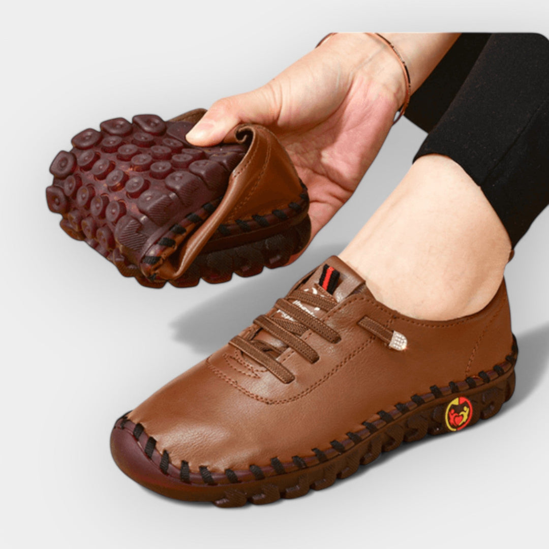 Women's slip-on comfort loafers with a cushioned ergonomic sole in black