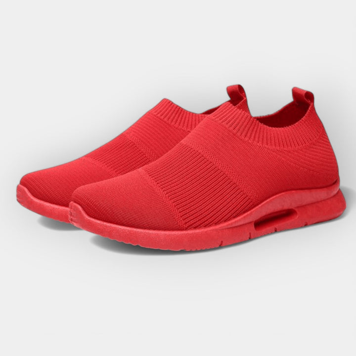 Women's cushioned walking trainers in black with a supportive ergonomic sole