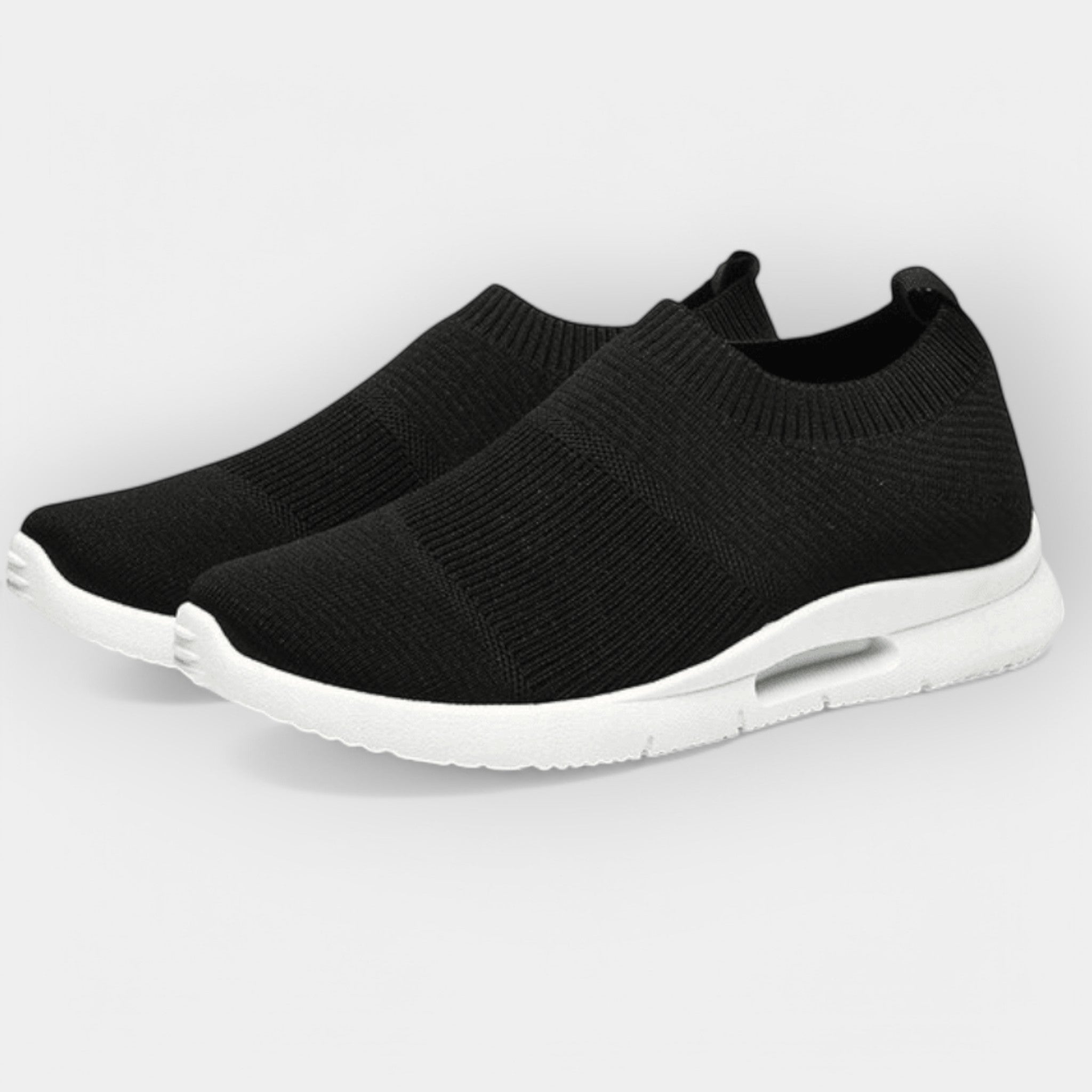 Women's cushioned walking trainers in black with a supportive ergonomic sole