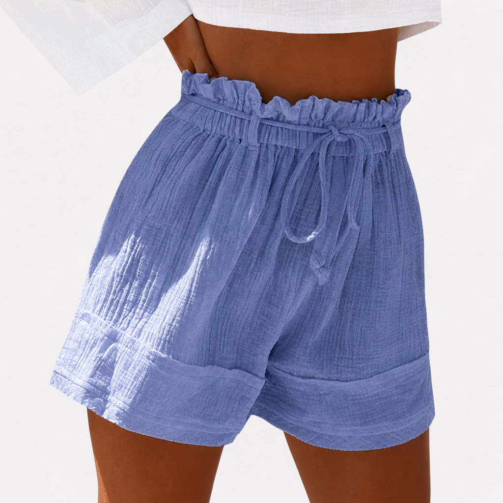 High-waist women's shorts in a range of vibrant colours including purple, orange, and green