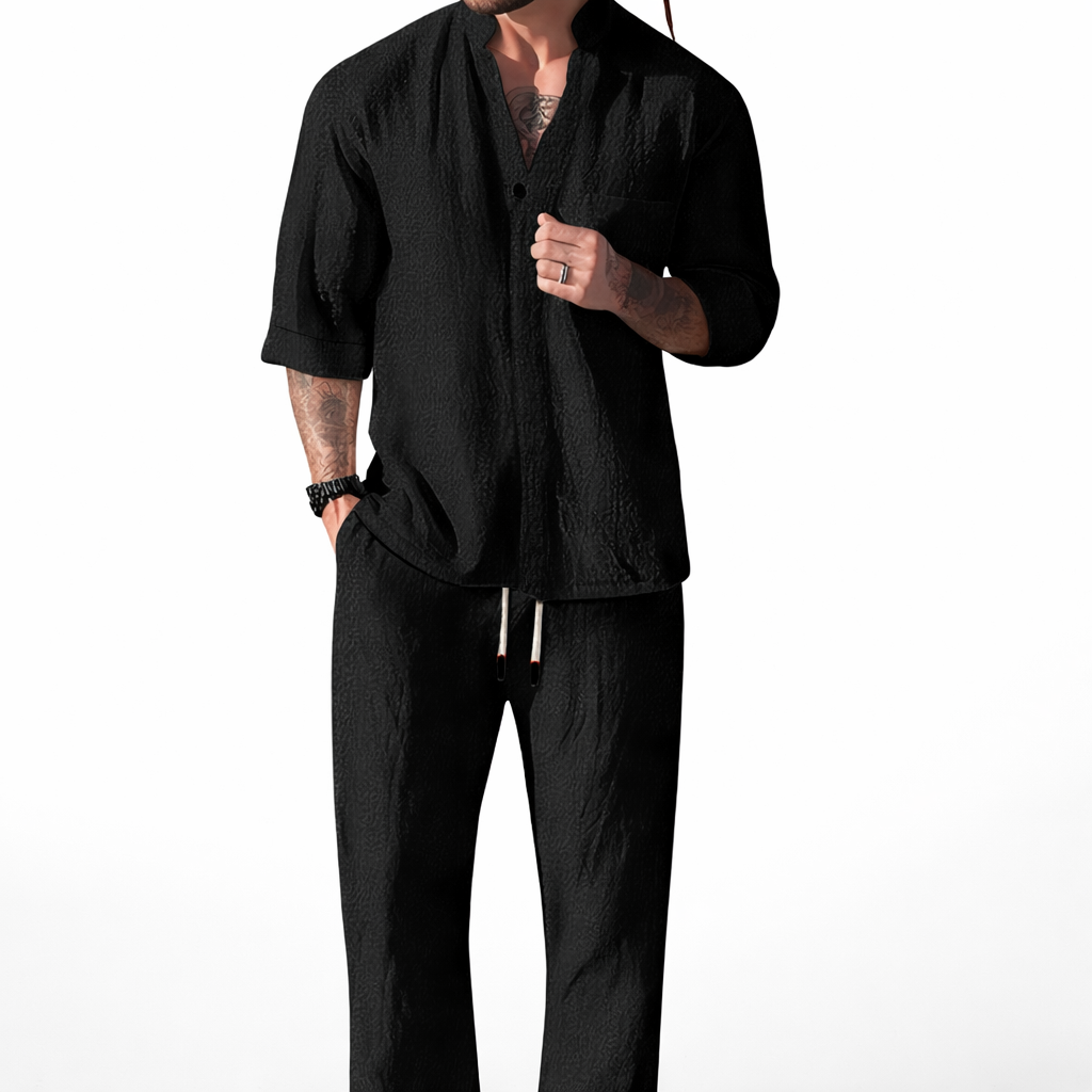 Men's coastal two-piece matching set in navy with a relaxed wide-leg cut and textured finish