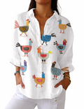 Multicolour novelty blouse with a playful eclectic hen motif print in a relaxed casual style
