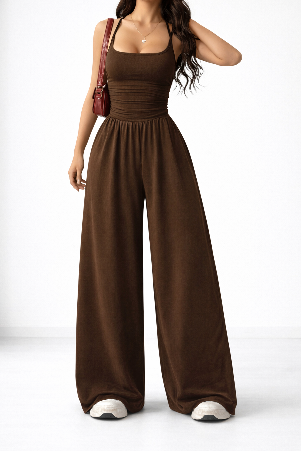 Wide-leg jumpsuit in black, also available in navy, brown, burgundy and light grey, with a gently shaped waist