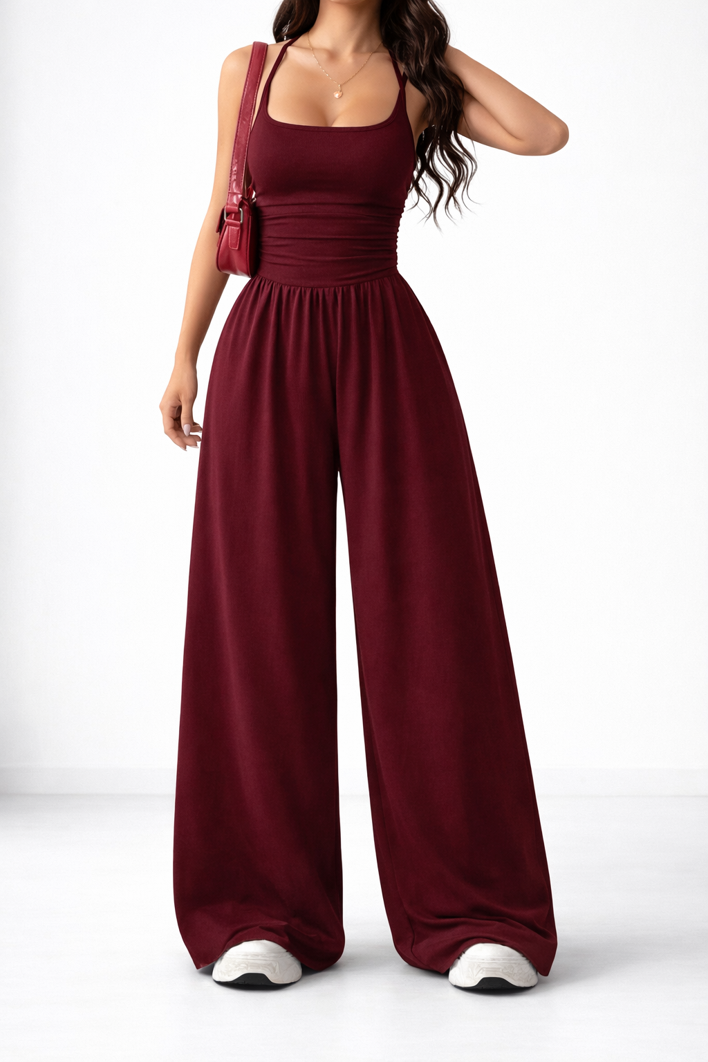 Wide-leg jumpsuit in black, also available in navy, brown, burgundy and light grey, with a gently shaped waist