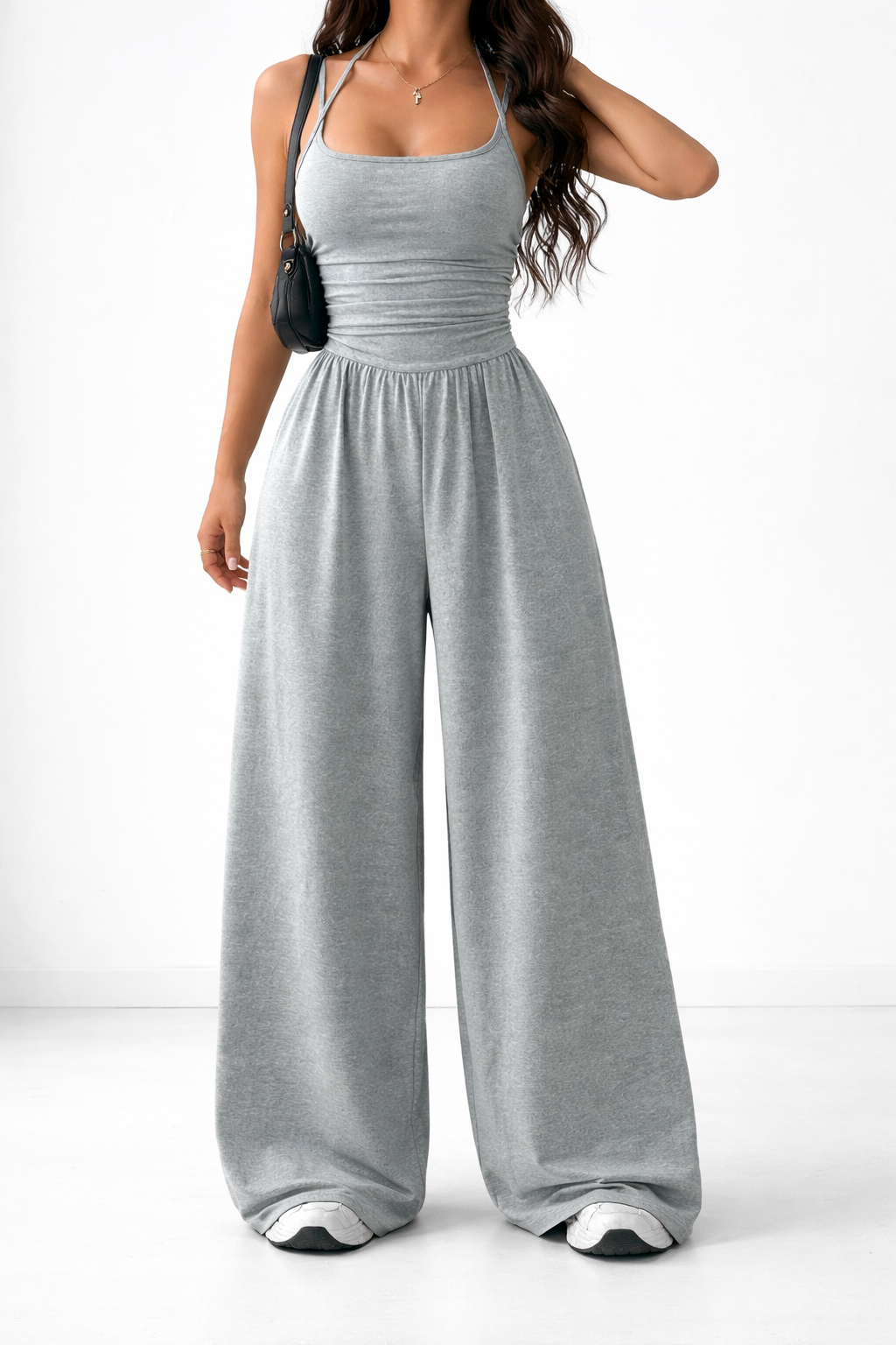 Wide-leg jumpsuit in black, also available in navy, brown, burgundy and light grey, with a gently shaped waist