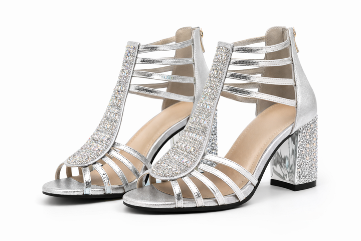 Women's gold metallic evening heels with decorative detail and a sleek, elegant silhouette