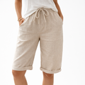 A pair of relaxed-fit summer shorts in beige with an elasticated drawstring waist