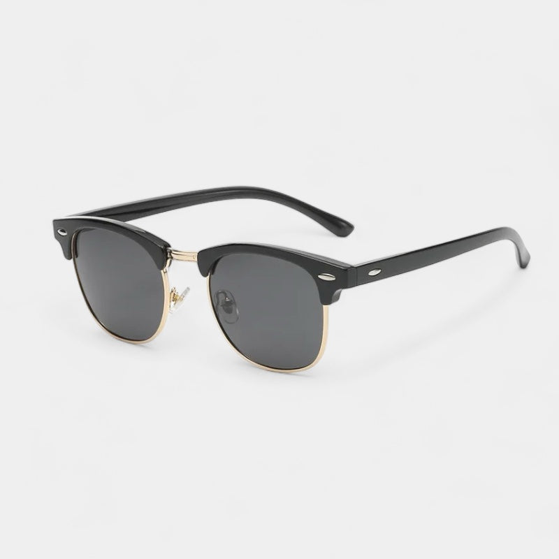 Men's vintage classic sunglasses in black and gold with a refined, understated frame