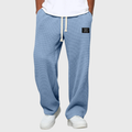Men's wide-leg drawstring trousers in grey with a relaxed silhouette and elasticated waist