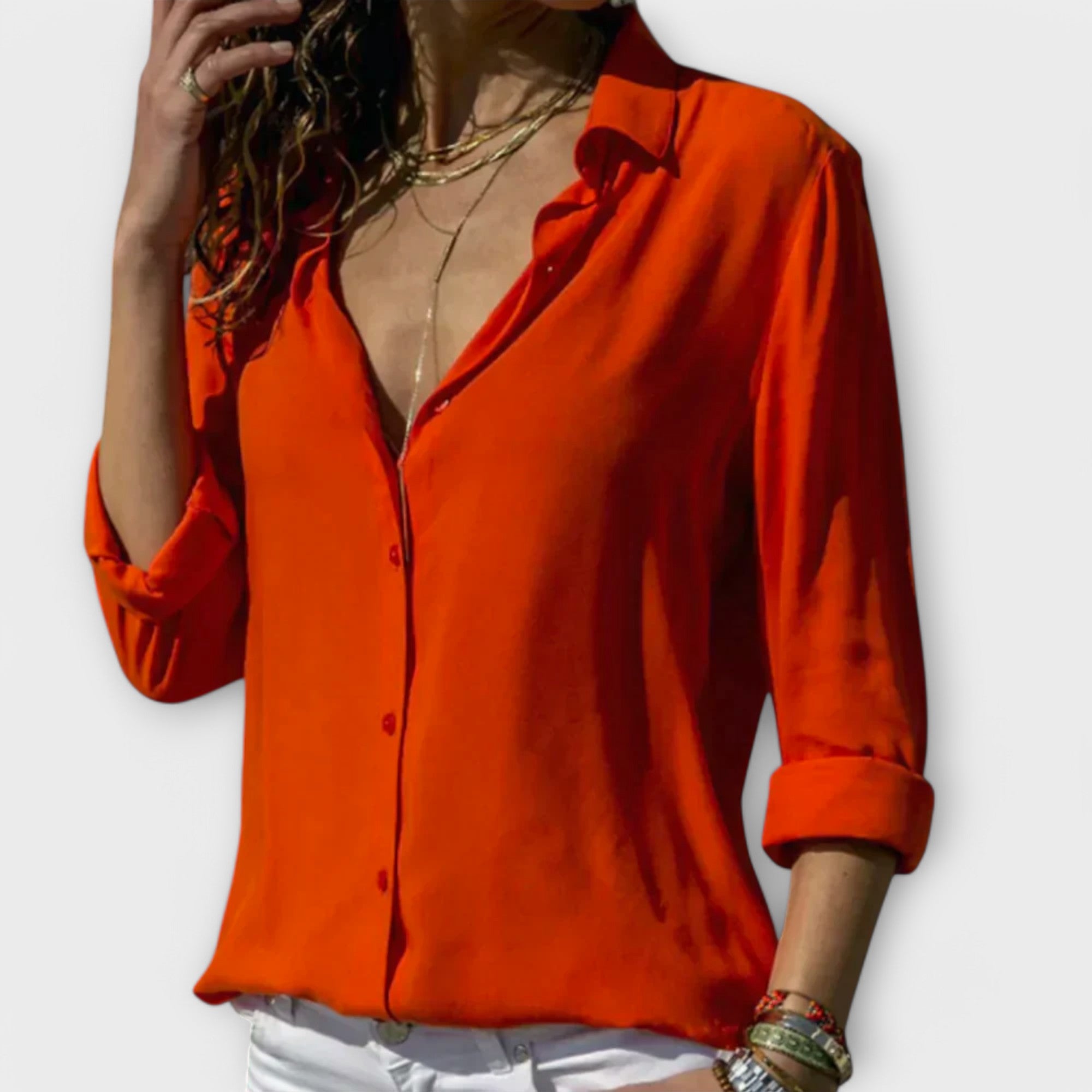 Classic collar pleated-front blouse with three-quarter sleeves in a refined, flowing shape