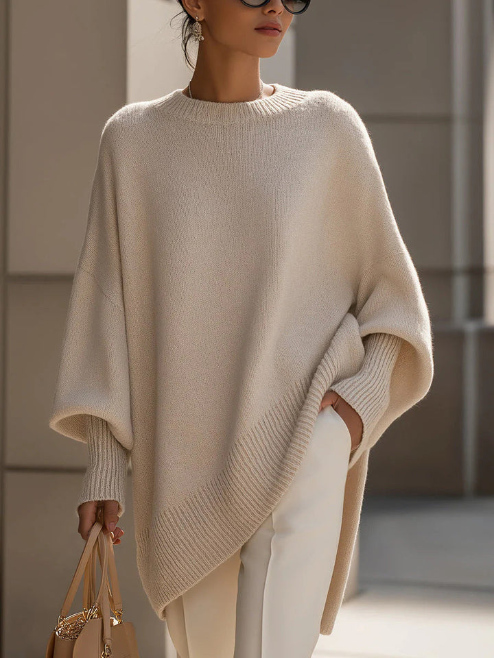 A woman wearing a soft crew neck jumper with jeans for a warm, easy everyday look.
