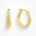 Gold twisted side ring earrings with polished finish